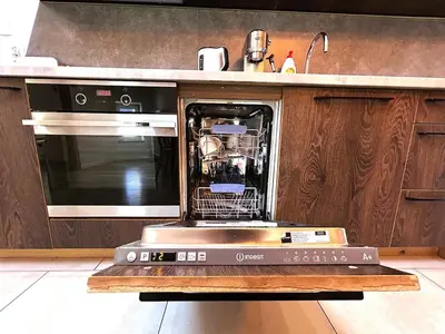 a dishwasher with its door open in a kitchen at Old Town Apt -Bosacka 2 bedrooms B43 in Kraków