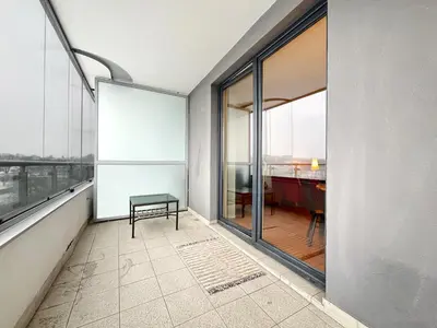 an empty room with a bench and a table at Apartment in cozy area for 4 guest, Cracow in Kraków