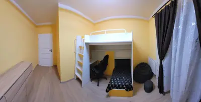a small bedroom with a bunk bed and a crib at Illumina nowoczesny apartament 50m2, spokojna okolica, 25min do centrum in Kraków