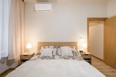 a living room with a couch and a table at D21 Cozy Apartment Old Town Kazimierz 50m2 in Kraków