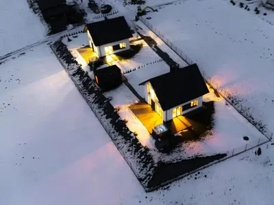 an aerial view of two houses in the snow at Domki Gasiówka in Jaworzna