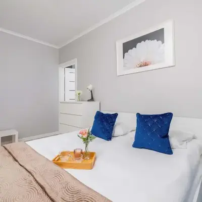 Cozy Apartment with Parking and Terrace in Kraków by Noclegi Renters