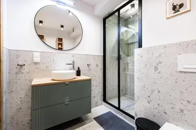 a bathroom with a sink and a mirror at Stylowe Studio - Nowy Kleparz - Kraków - by Upstairs in Kraków
