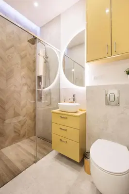 a bathroom with a toilet and a sink and a shower at Felicjanek 15 - Central 3-Bedroom Apartment - by Upstairs in Kraków