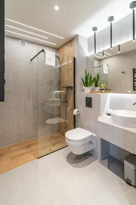 a bathroom with a shower and a toilet and a sink at Dasto Jacuzzi Old Town Cracow in Kraków
