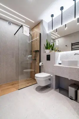 a bathroom with a toilet and a shower and a sink at Dasto Jacuzzi Old Town Cracow in Kraków