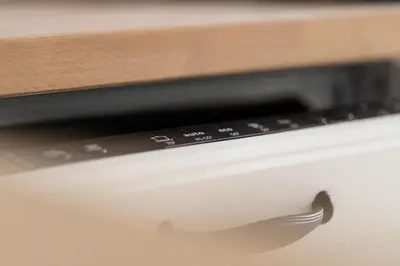 a close up of a microwave oven control panel at ANTA Apartments Plac na Groblach in Kraków