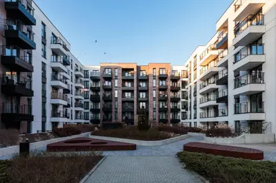 a view of an apartment complex with buildings at City of the Kings-Milford Sound in Kraków