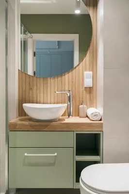 a bathroom with a sink and a mirror at Native Apartments Kościuszki 39I29 in Kraków