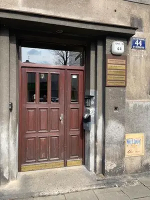 a bath room with a shower with a towel at ALEX Topolowa in Kraków