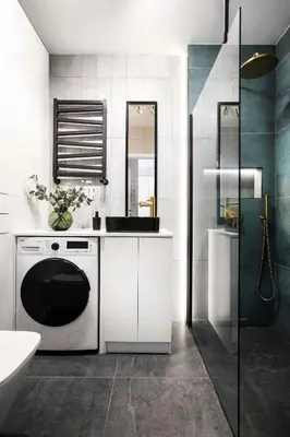 a bathroom with a sink and a washing machine at Cozy studio next to Cracow Vistula Boulevrads, Old Town in Kraków