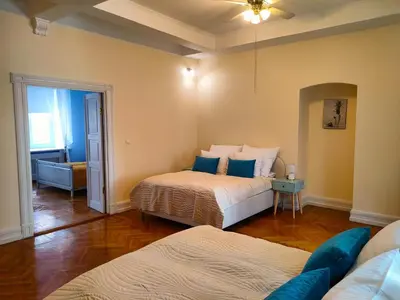 a bedroom with two beds in a room at Kings City - Central Apartment in Kraków