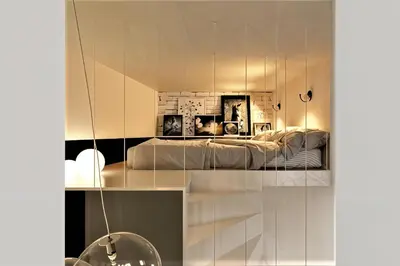 a room with a bed and a mirror at Cracow Fancy Brick #3 - Old Town in Kraków