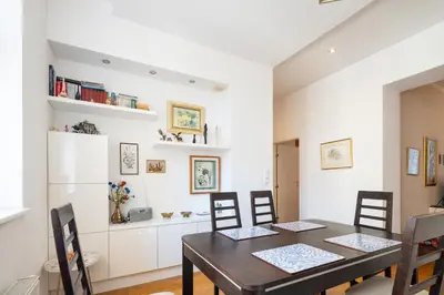 a dining room with a table and chairs at One Bedroom city center Krakow in Kraków