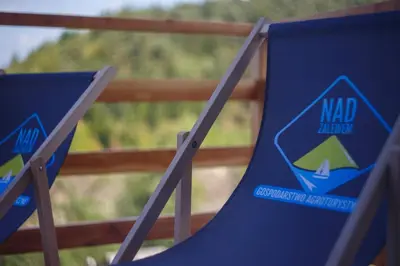 a pair of chairs with a mad island sign on them at Lawendowy Domek in Jaszczurowa