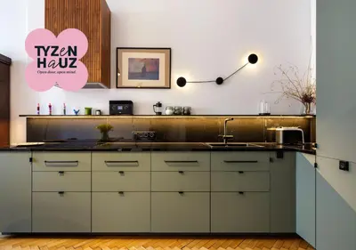 a kitchen with a sink and a counter at Bracka by Tyzenhauz in Kraków