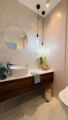 a bathroom with a tub and a sink at Royal Blue Place Cracow in Kraków
