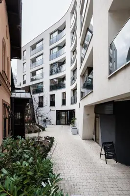 an external view of a building with a courtyard at City of the Kings-Copper Nest in Kraków