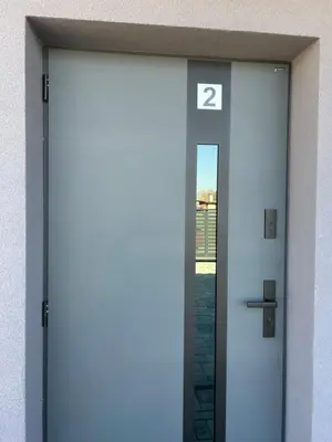 an elevator door with the number two on it at DS Apartamenty Zator in Zator
