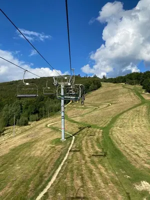 a gondola ride in a field on a hill at Agroturystyka Pod Jałowcem in Stryszawa