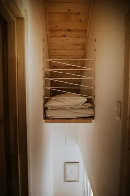 a room with a closet with wooden ceilings at Osada Zawadka in Zawadka