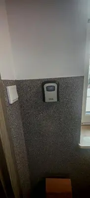 a counter top with a clock on top of it at Secret Room Niepołomice in Niepołomice