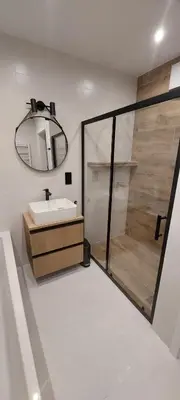 a bathroom with a sink and a mirror at Secret Room Niepołomice in Niepołomice