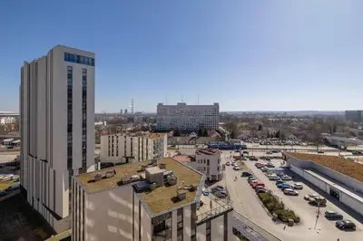 an aerial view of a city with buildings at Elegant Apartment with Parking near Tauron Arena Kraków by Noclegi Renters in Kraków