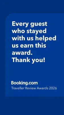 a blue picture with the words every guest who stayed with us helped us earn this at New Fifth Apartament in Kraków