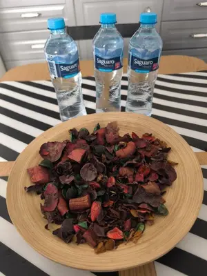 a plate of food on a table with two bottles of water at Nowy Kleparz 3 in Kraków