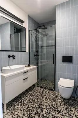 a bathroom with a toilet and a sink and a shower at luxusowy apartament w centrum Krakowa in Kraków