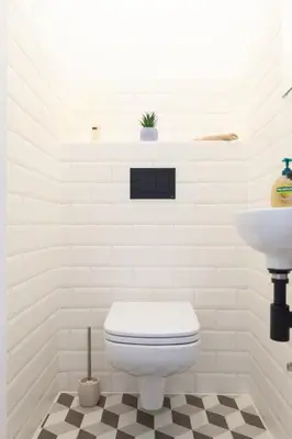 a bathroom with a sink and a shower at Bright Rose in Kraków