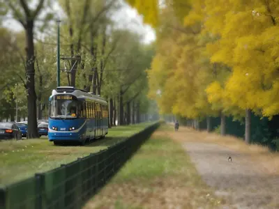 a blue bus parked on the side of a road at Cracow Fancy Brick #2 - Old Town in Kraków