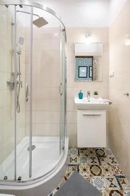 a bathroom with a shower and a sink at Mint&Jade studio B in Kraków