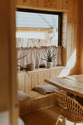 a large wooden house with a tv on the side at Domki Pod Halą Krupowa - Domek Zawoja in Sidzina