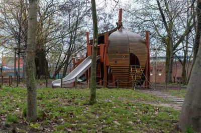 a playground in a park with a slide at Malila Premium Apartments Cracow Rakowicka 20L- 453 in Kraków