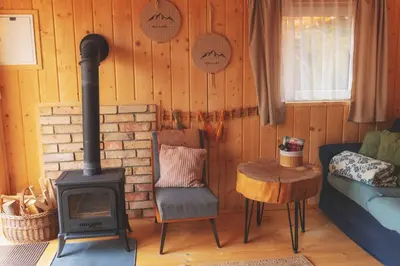 a house with a gazebo in front of it at Domki pod Halą Krupową - Chata na szlaku in Sidzina