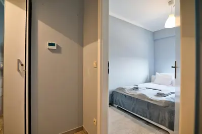 a small bedroom with a bed in a room at ApartClaudia by Housine in Zator