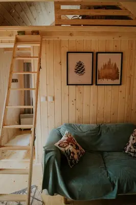 a wooden tub in a room with a window at Domki pod Halą Krupową - Tiny House w Lesie in Sidzina