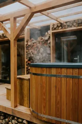 a house with a solar panel on top of it at Domki pod Halą Krupową - Tiny House w Lesie in Sidzina