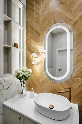 a bathroom with a white sink and a mirror at Apartament Krasińskiego- w centrum Krakowa, doskonała lokalizacja in Kraków