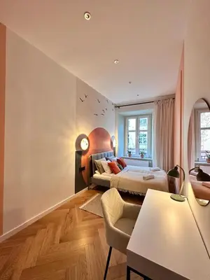 a bedroom with two beds and a table and chairs at Modern DeLux Apartment! - air conditioning in Kraków