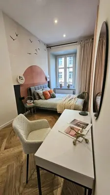 a living room with a couch and a table at Modern DeLux Apartment! - air conditioning in Kraków