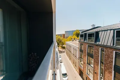 a view from the balcony of a building at Kątowa Studio - Sauna, AC, balcony in Kraków