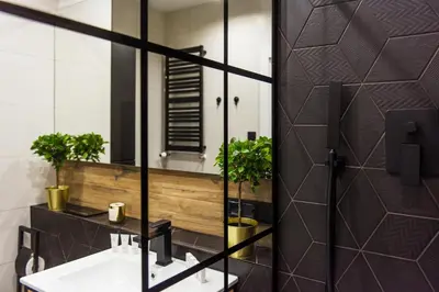 a bedroom with a large bed and a large window at Bed&Bath Modern Old Town Apartments in Kraków