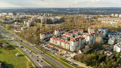 an aerial view of a city with buildings and a highway at Podłęska Comfort Apartment by BookingHost in Kraków