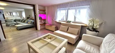 a living room with a couch and a table at IMPERIaL 110 m2, 4 rooms, Old Town, 300m Wawel, Breakfest in Kraków