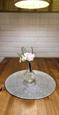 a glass vase with a pink flower on a table at IMPERIaL 110 m2, 4 rooms, Old Town, 300m Wawel, Breakfest in Kraków