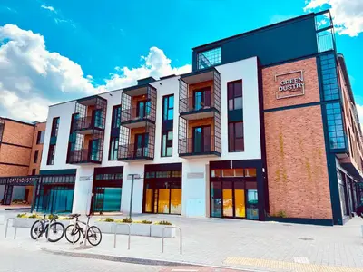 a building with bikes parked in front of it at Luxury penthouse with large terrace in Kraków