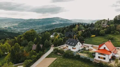 an aerial view of a house in the mountains at Widokówka Kudłacze Domek z Jacuzzi in Pcim